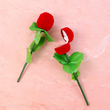 Side view of two-piece artificial rose ring box set with realistic flower design for ring presentation