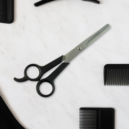 Hair thinning scissors showing detailed micro-toothed blade for bulk reduction