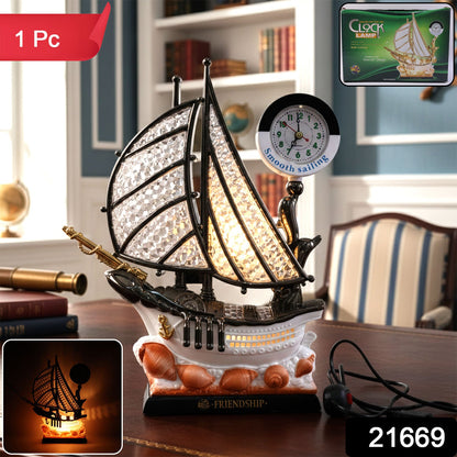 Decorative nautical ship clock lamp with glowing sails