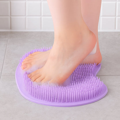 Top view of purple silicone foot scrubber mat with suction cups
