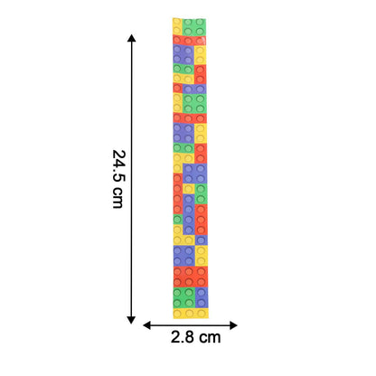 Colorful snap slap bracelet beside ruler showing size for kids