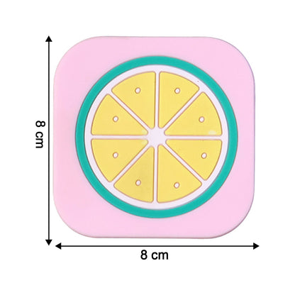 Bright yellow lemon silicone drink coaster displayed on coffee table