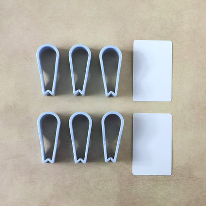 Towel clips holding clothes on a laundry line