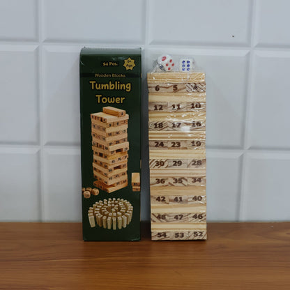 Family members gathered playing the Tumbling Tower wooden block game