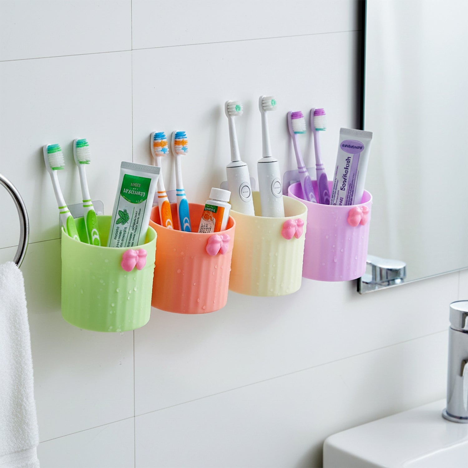 Close-up of wall mount brush holder keeping toothbrushes hygienic