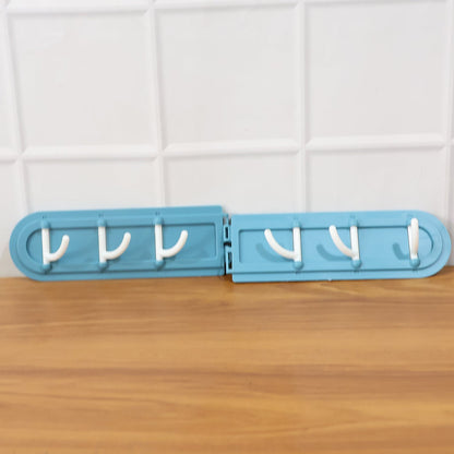 Foldable rotating hook rack demonstrating 180-degree rotational movement