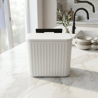 Side view of small kitchen waste bin