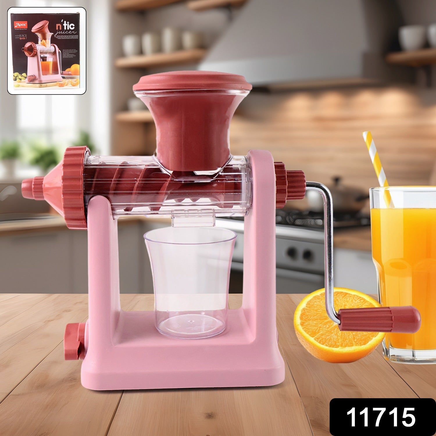 Manual juicer with vacuum lock base in use extracting fresh juice