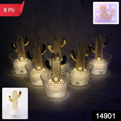 Close-up of cactus LED decorative candle showing golden cactus inside transparent holder