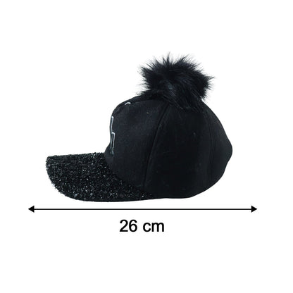 Side view of trendy winter baseball cap with pom pom