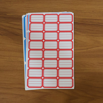 Backing side of writable label stickers showing strong adhesive layer