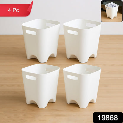 Plastic waste paper basket set used in a clean, modern home office setting.