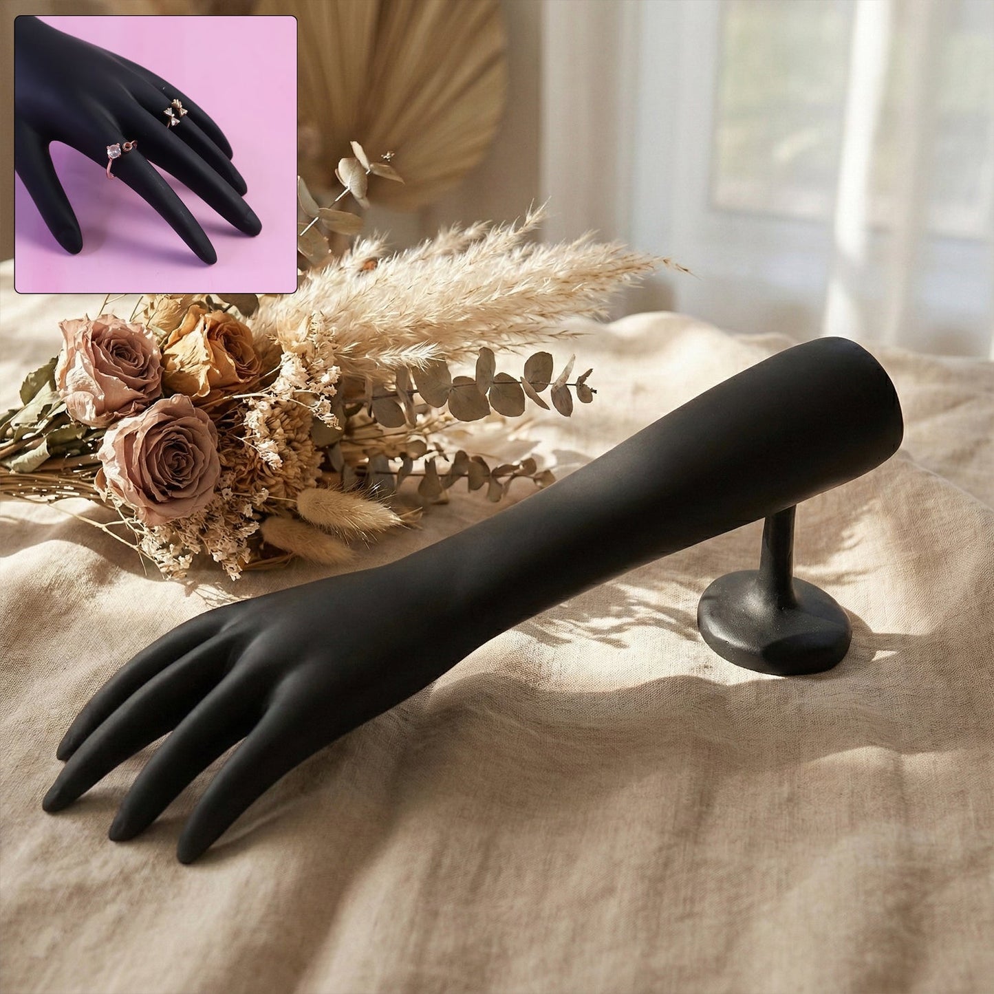 Black hand jewelry display stand with matte finish showing front view
