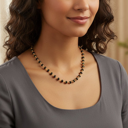 Long black beads mangalsutra necklace with golden details