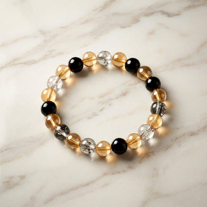Close-up image of glossy crystal beads on the Dual-Tone Stretch Bracelet