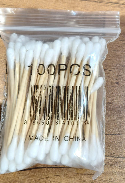 Eco-friendly cotton swabs packaging highlighting biodegradable wooden stems