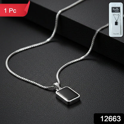 Close-up of men's pendant chain with black rectangular stainless-steel pendant