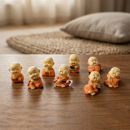 Variety of Mini Monk Buddha figurines in different poses for spiritual ambiance