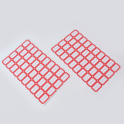 Closeup of writable blank label sticker sheet with red border
