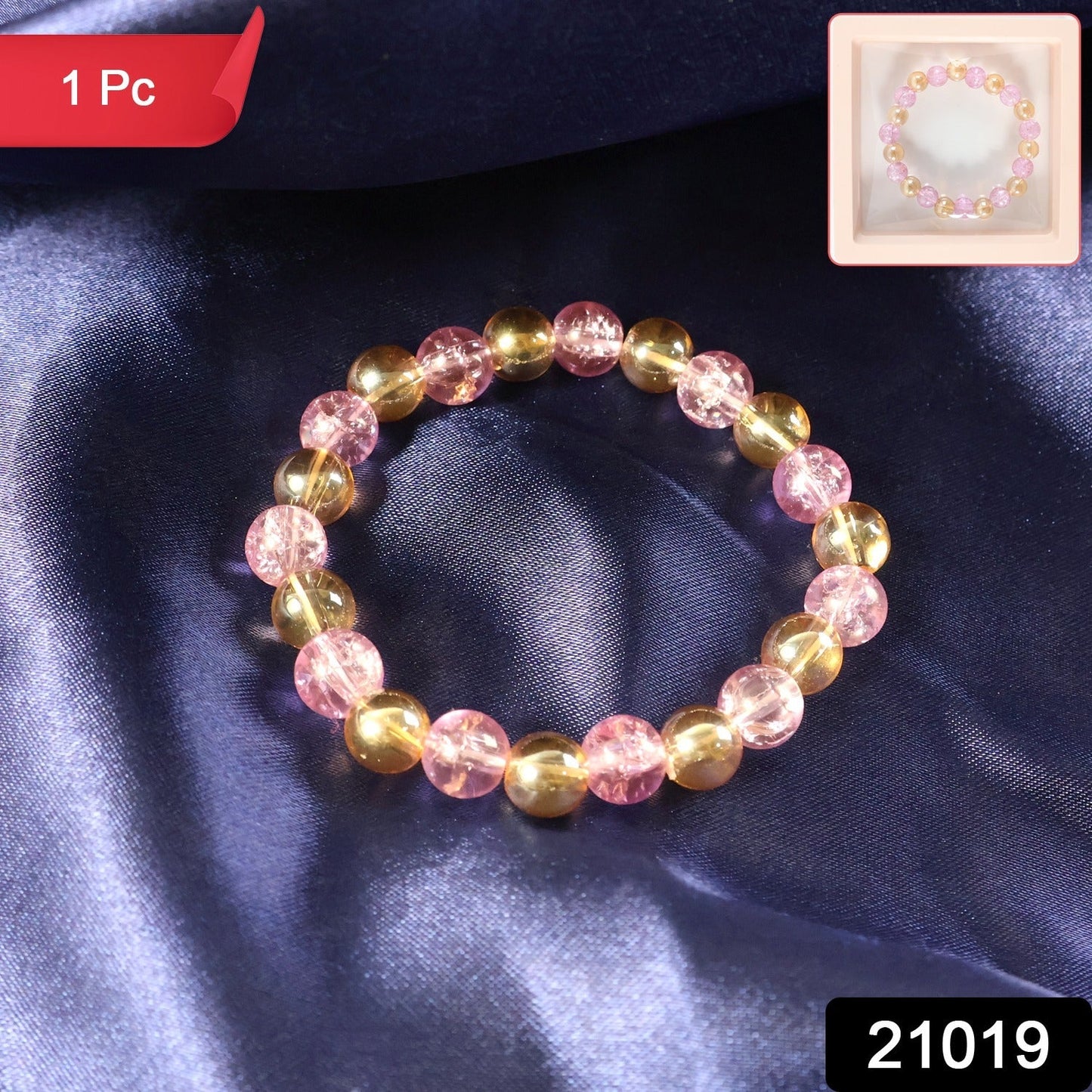 Stretchable elastic dual-tone crystal beaded bracelet worn on wrist for daily elegance