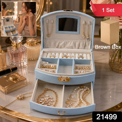 Open view of multi-layer jewelry box with mirror showing compartments in India