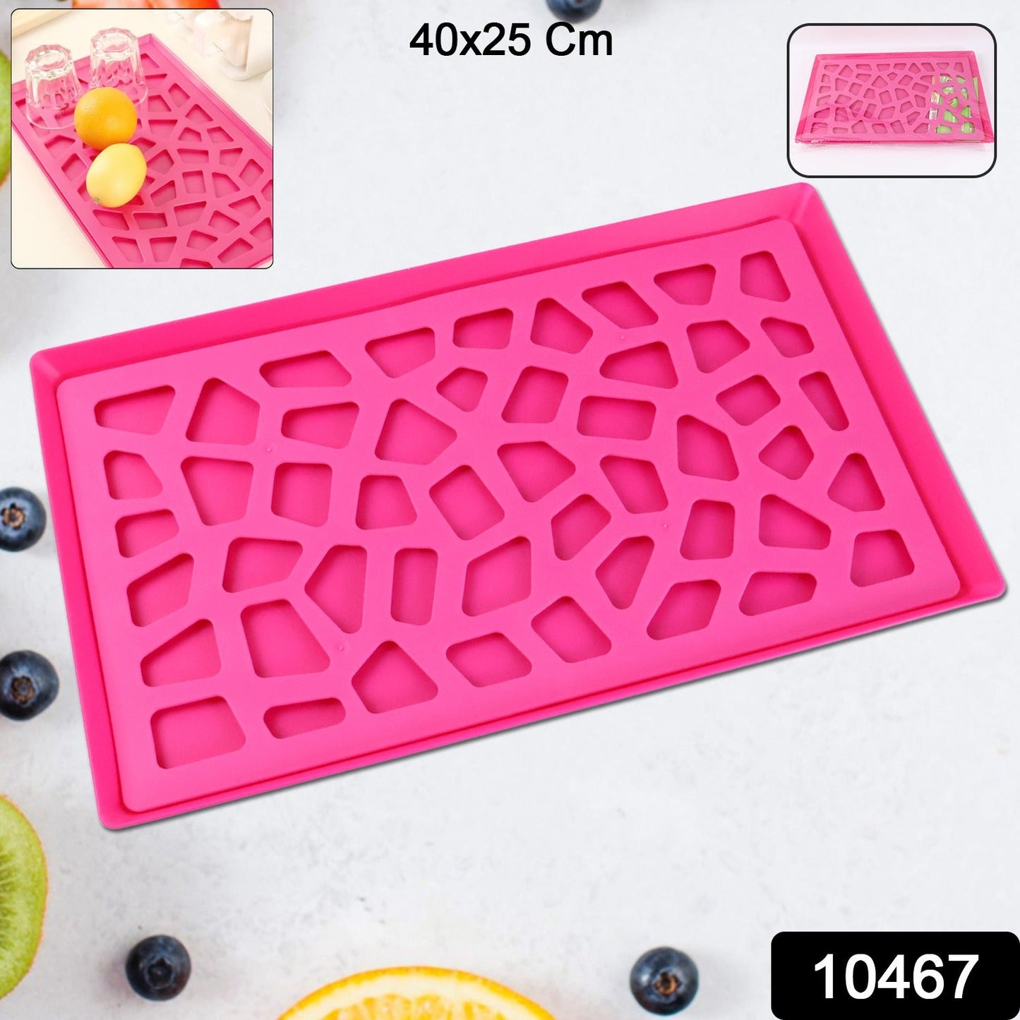 Close-up of plastic kitchen tray with stylish hollow cut-out pattern for draining