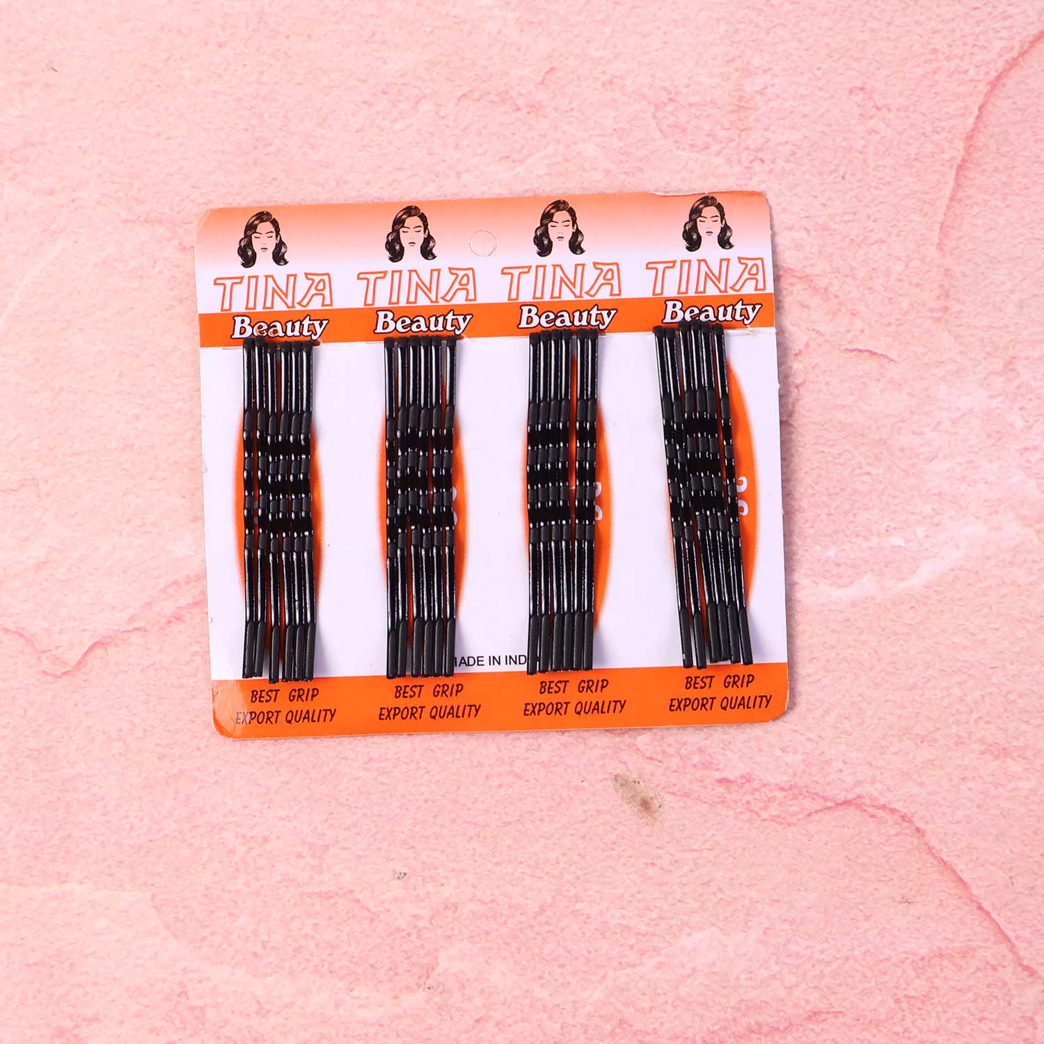 Angled view of black hair bobby pins for hairstyling