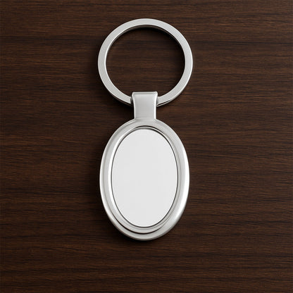 Sleek oval metal keychain showcasing durable build and chrome shine