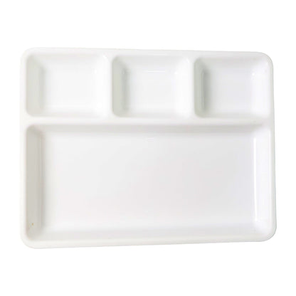 Stack of multiple 4-compartment serving trays for compact storage.