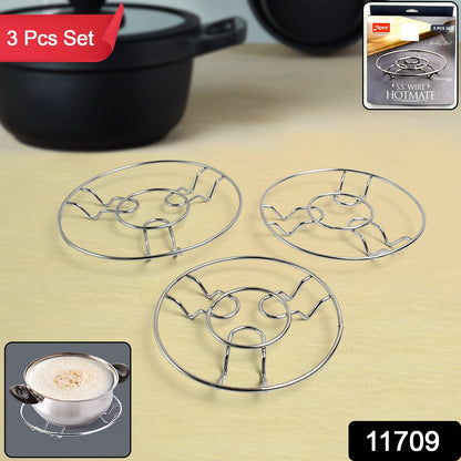 Close-up view of stainless steel wire trivets showing heat-resistant design
