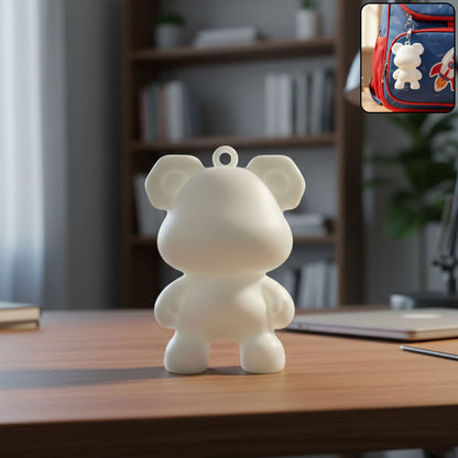 Cute bear shape mini figure keychain with hanging loop attached to bag