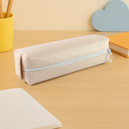 PU leather pencil pouch with the zipper open, revealing organized pens and pencils.